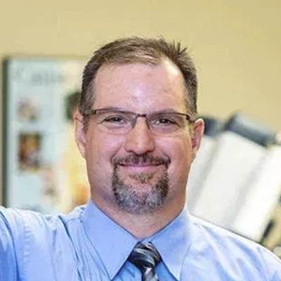 A headshot of Dr. Brian Fritz, a chiropractor at Dunham-Fritz Chiropractic