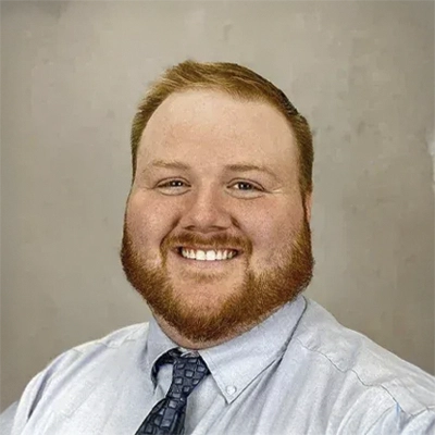 A headshot of Dr. Ian Slagle, a chiropractor at Dunham-Fritz Chiropractic